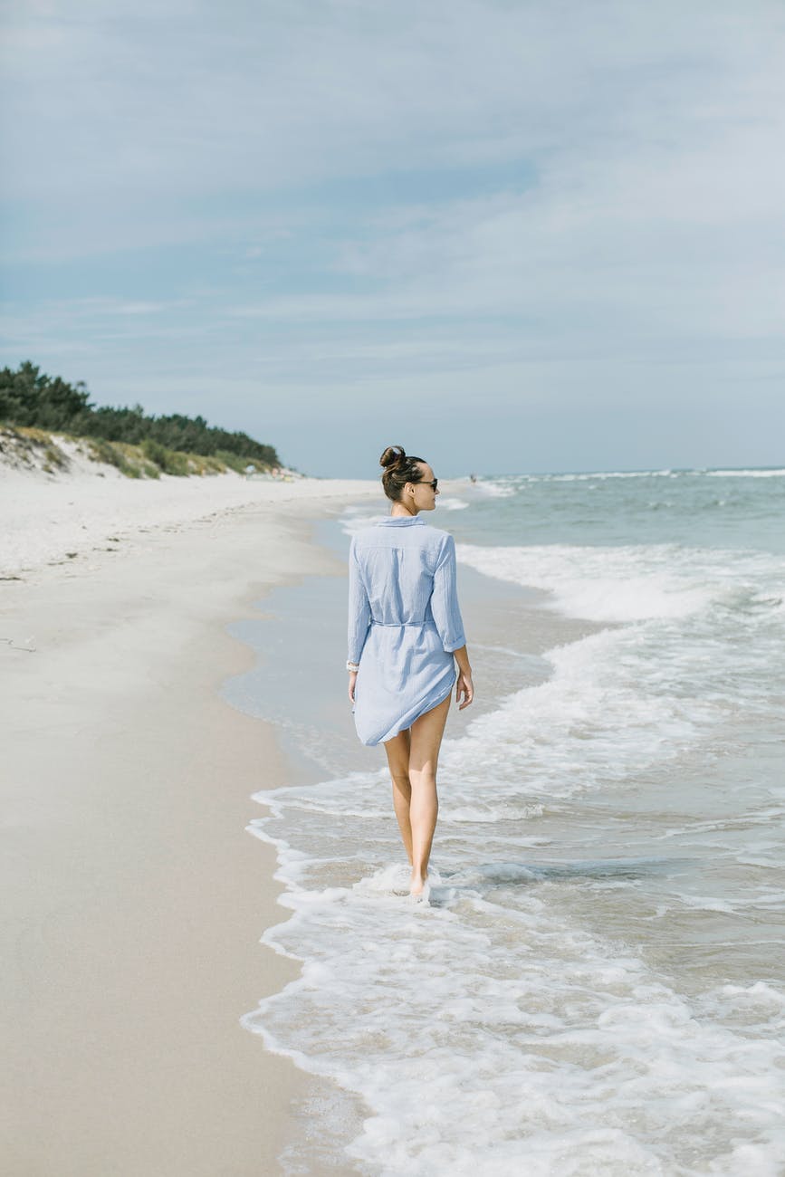 woman walking on beach