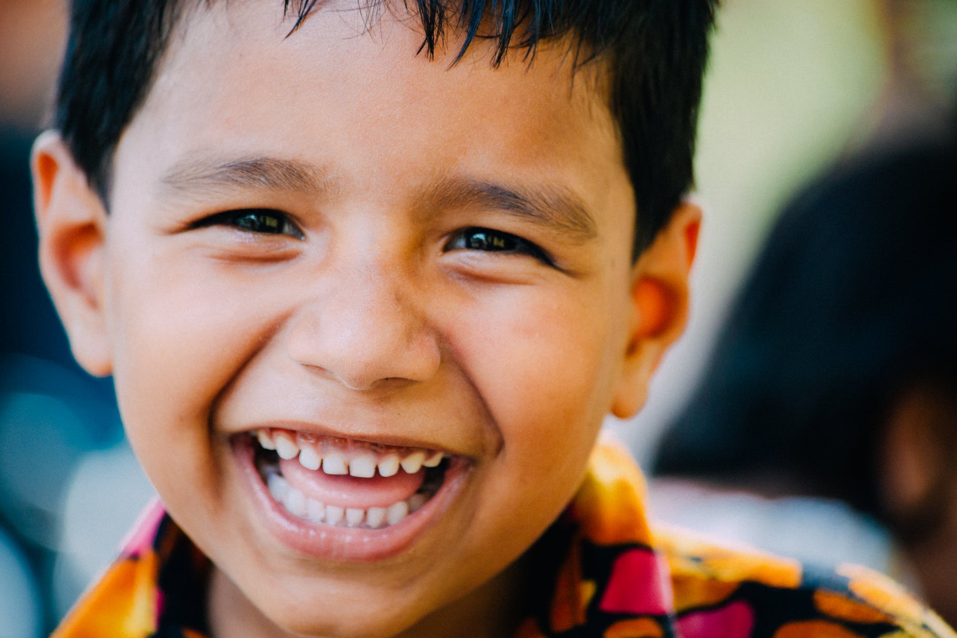 close up photo of boy s face